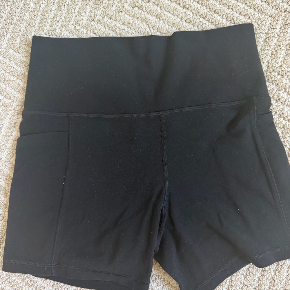 Athleta Black salutation with stash pockets S